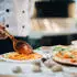 Relaxdays 4 x Pizzablech rund Schwarz