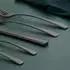 LuxusKollektion Tafelmesser 12er-Set, Edelstahl mattschwarz, Wellenschliff, 23,8cm
