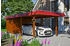 Skan Holz Einzelcarport Wendland 362x870 cm 206 cm Einfahrtshöhe mit Abstellraum mit EPDM-Dach rote Blende Nussbaum