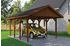 Skan Holz Einzelcarport Wallgau 430x600 cm 215 cm Einfahrtshöhe mit schwarzen Dachschindeln Nussbaum