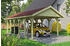 Skan Holz Einzelcarport Wallgau 430x900 cm 215 cm Einfahrtshöhe mit roten Dachschindeln Grün
