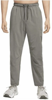 Nike Unlimited vielseitige Dri-FIT Hose mit Reißverschluss am Bündchen für Herren - Grün FB7548-320