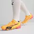 Puma Ultra Ultimate FG/AG sun stream/puma black/sunset glow (Damen) (107767-03)