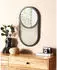 Beliani Baleal Ovaler Wandspiegel Rattan Naturfarben 30x56cm (Baleal)
