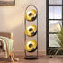 Lindby Stehlampe Muriel 3-fl. schwarz/gold
