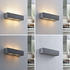 Lindby Nellie LED-Beton-Wandlampe, Breite 35,3 cm