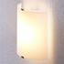 Lindby Halbrunde LED-Wandleuchte Helmi mit Glasschirm