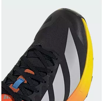 Adidas Terrex Agravic 4 core black/grey two/semi impact orange – Continental-Sohle mit Stollenprofil auf unebenem Terrain
