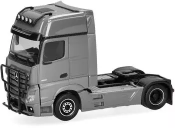 Herpa H0 (1:87) 311533-006 - Mercedes-Benz Actros 18 L Gigaspace Zugmaschine 2achs mit Lampenb&uuml;gel und Rammschutz grau
