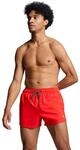 PUMA Badeshorts "PUMA SWIM MEN SHORT LENGTH SWIM SHORTS" mit seitlichen