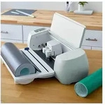 - cutting machine roll feeder