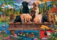 Hundefamilie am See
