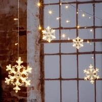 Spetebo LED Schneeflocken Lichtervorhang mit Timer Batterie betrieben - 210 cm -
