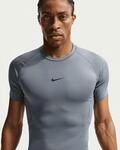 Nike FB7932-084 M NP DF Tight TOP SS Sweatshirt Herren Smoke Grey/Black Gr&ouml;&szlig;e M