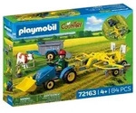 Kleiner Traktor mit Heuschwader