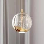 Lucande LED-Pendellampe Hayley, &Oslash; 9 cm, goldfarben, Glas