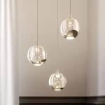 Lucande LED-Pendellampe Hayley, &Oslash; 25 cm, 3-flg., chrom, Glas