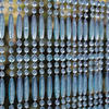 Türvorhang aus durchsichtigen und blauen Perlen Fréjus