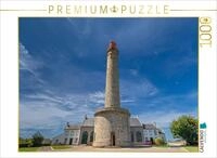 Puzzle &middot; EIN Leuchtturm vor einem blauen Himmel mit Einer feinen |...