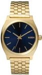 Nixon time Teller Herren Uhr analog Quarzwerk mit Edelstahl vergoldet Armband