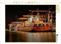 Puzzle &middot; Containerschiff San Felipe Majoro | Im warmen Glanz der Hafenlichter...