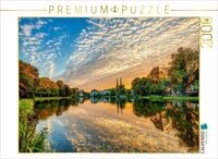 Puzzle &middot; Wenn der Himmel das Wasser ber&uuml;hrt | Abendstimmung &uuml;ber L&uuml;beck im