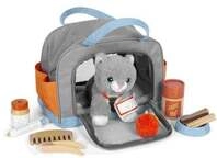 Katze mit Tasche und Pflege-Set