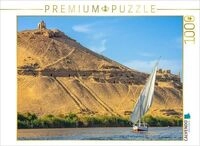 CALVENDO Puzzle Segeln vor Assuan: Feluke auf dem Nil vor den Felsengr&auml;bern...