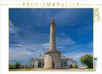 CALVENDO Puzzle Ein Leuchtturm vor einem blauen Himmel mit einer feinen