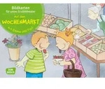 Auf dem Wochenmarkt mit Emma und Paul. Kamishibai Bildkartenset. von Monika...
