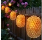 Spetebo LED-Lichterkette Solar Deko Beleuchtung mit 10 ovalen Lampions in Rattan