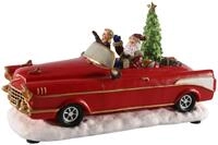Spetebo Weihnachtsmann Weihnachts Szene Weihnachtsmann im Oldtimer rot, Tisch Deko