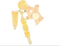 Essence Lipgloss Care Bears lipgloss keychain 03 - SHINE gelb, 1-tlg.