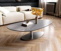 DELIFE Couchtisch Edge, Oval 140x75 cm Keramik Beton Grau Vibany Edelstahl...