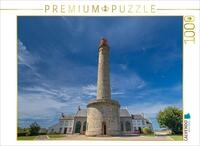 CALVENDO Puzzle CALVENDO Puzzle Ein Leuchtturm vor einem blauen Himmel mit einer