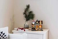 KONSTSMIDE Weihnachtshaus Weihnachtsdeko, LED Szenerie Popcornfabrik, mit...