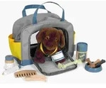 Hund mit Tasche und Pflege-Set