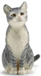 Schleich Spielzeugfigur Katze sitzend.