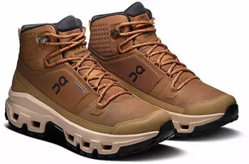 On Cloudrock Mid Waterproof Women sphinx/sand – Dämpfung trifft auf direkten Bodenkontakt