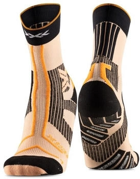 X-Socks Trailrun Terraskin Expert Crew Laufsocken schwarz frischpfirsich xschwarz leuchtendorange