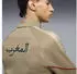 Puma KING Anthem Trainingsjacke beige/grün